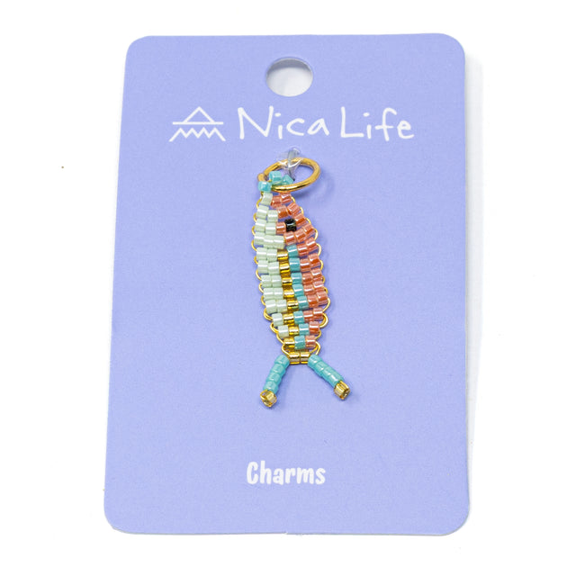 Coral, blue, mint beaded fish charm for charm bracelet or necklace on purple Nica Life branded card