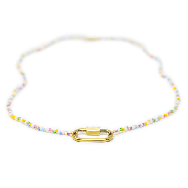 Multicolored beaded charm bar necklace with a gold carabiner clasp for charms on a white background