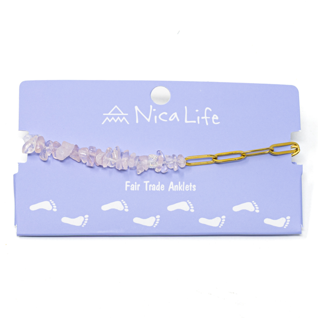 Gold charin & pink stone anklet shown on a purple Nica Life branded card
