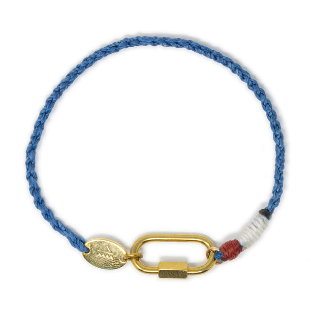 Blue braided charm bracelet with a gold carabiner clasp for charms with white & read accents on a white background