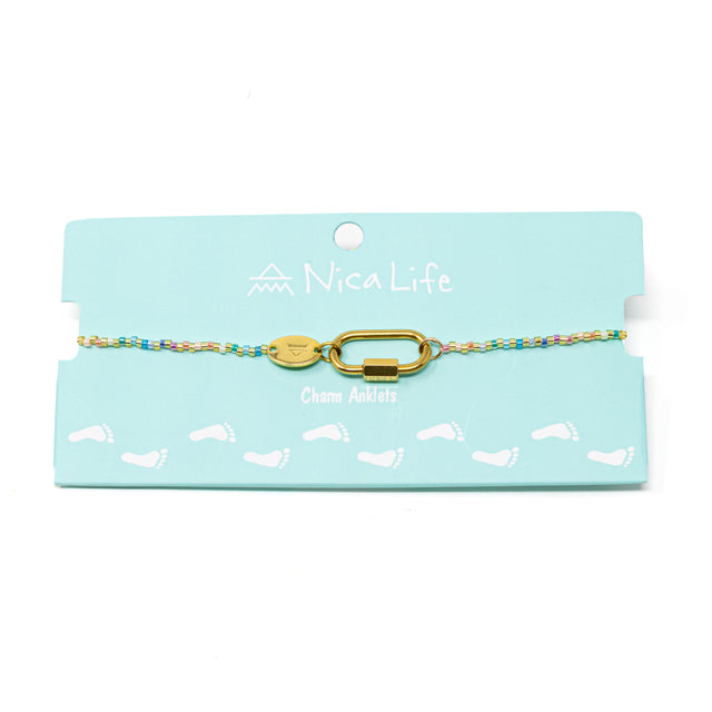 Pastel rainbow color beaded charm bar anklet with carabiner clasp for charms show on teal Nica Life branded card