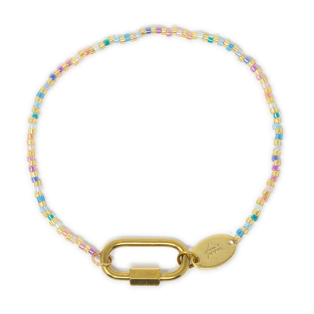 Colorful bead charm bar bracelet with a gold carabiner clasp for charms on a white background