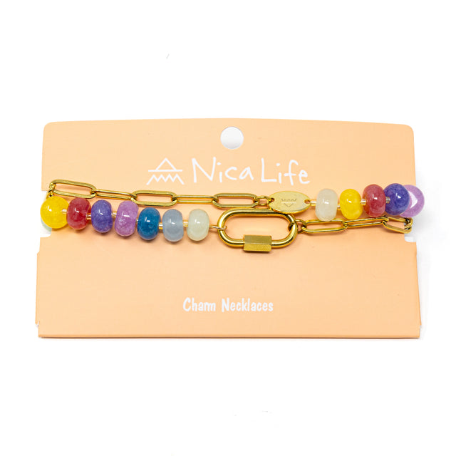 Colorful stone charm necklace on a Nica Life branded card