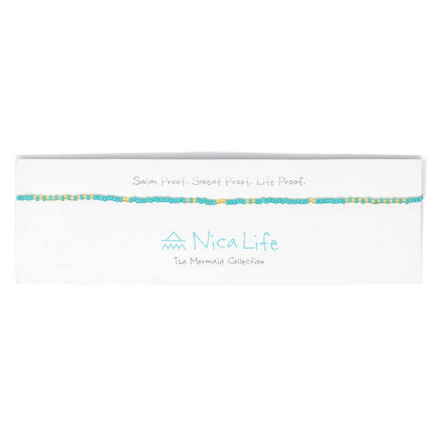 Teal & gold waterproof beaded choker on Nica Life branded card