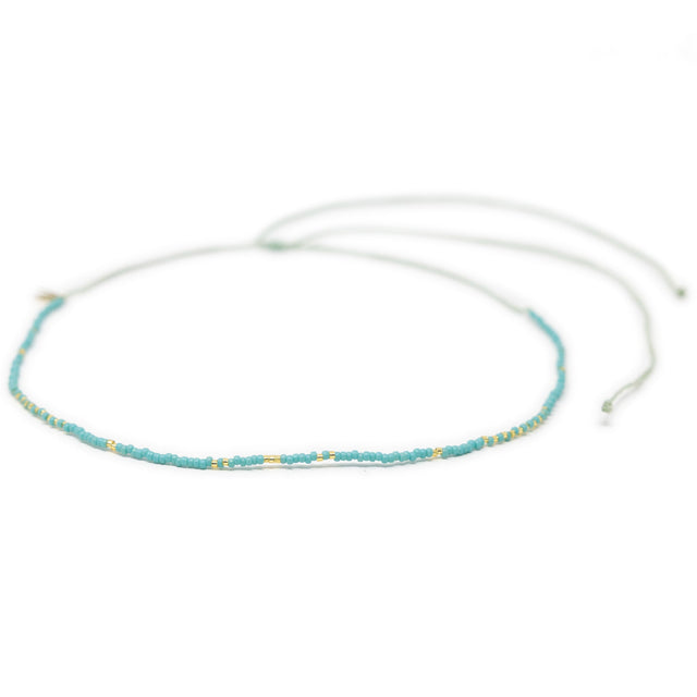 Teal & Gold Waterproof Surfer Choker on White front view