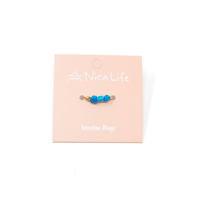 Turquioise stone & gold ring on Nica Life branded card