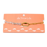 Charm anklet handmade with gold chain & aquamarine beads with a gold carabiner clasp on Nica Life branded card