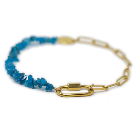 Anklet with bright blue apatite beads and gold chain with a carabiner clasp for charms on a white background