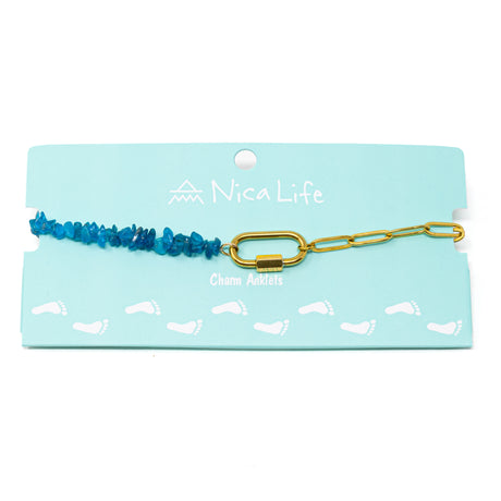 Anklet with blue apatite beads and gold chain with a gold carabiner clasp on a Nica Life branded card