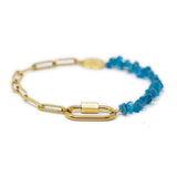 Charm Bracelet with half gold chain and  half bright blue apatite beads with a carabiner clasp on a white background
