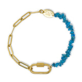 Bracelet with striking blue apatite beads, gold chain, and a gold carabiner clasp on a white background