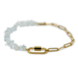 Anklet with gold chain and aquamarine stone beads with a carabiner clasp on a white background