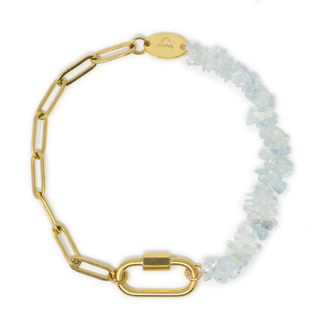 Gold chain charm bracelet with aquamarine beads and a carabiner clasp on a white background
