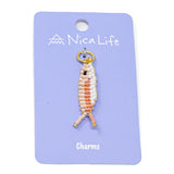 Handmade two tone pink fish charm for a charm bracelet or necklace on purple Nica Life branded card 