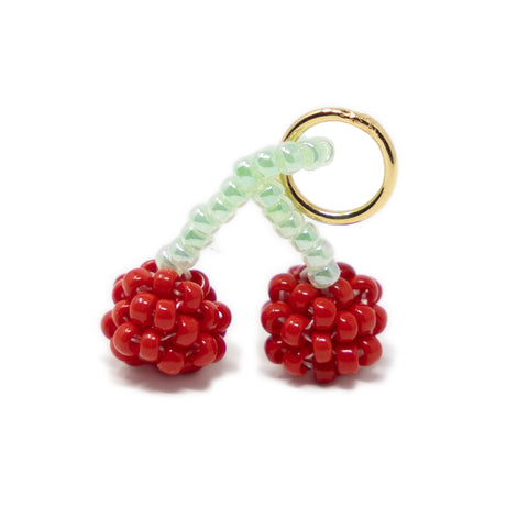 Beaded cherry charm with red and green beads for a charm necklace or bracelet  on a white background