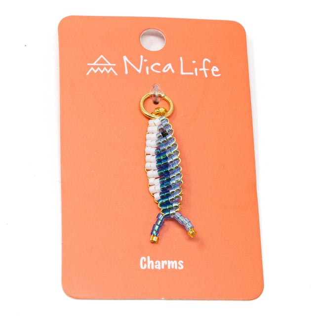 Two tone hand beaded fish charm for charm necklaces or bracelets shown on coral Nica Life branded card