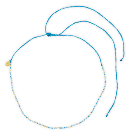 Blues & gold beaded waterproof choker shown on white top view