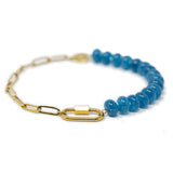 Blue stone pony bead and gold chain charm bar anklet with a gold carabiner for charms show on white front view