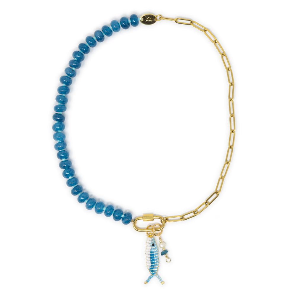 Necklace with blue beads and gold chain, featuring a fish charm on a gold carabiner clasp on a white background