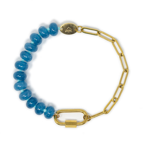 Bracelet with blue beads and gold chain with a gold carabiner for charms on a white background top view