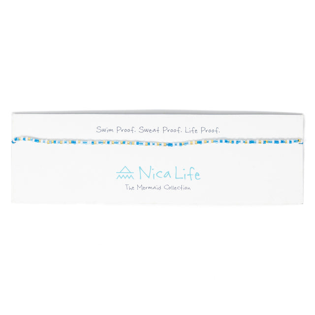 Multi color blues seed bead choker on a Nica Life branded card