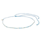 Blues and gold beaded choker with adjustable waterproof clasp shown on white from front 