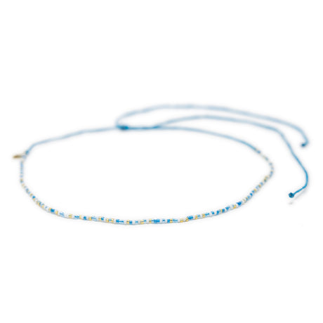 Blues and gold beaded choker with adjustable waterproof clasp shown on white from front 