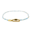 Blues & gold charm bar anklet with carabiner clasp for charms shown on white front view.