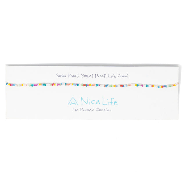 Brightly colored seed bead chokers shown on a Nica Life branded card