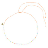 Bright colored beaded waterproof choker shown on white top view