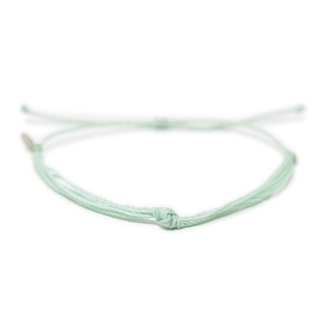 Light mint color knot anklet shown on white from the front