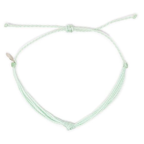 Light mint string knot anklet top view on white
