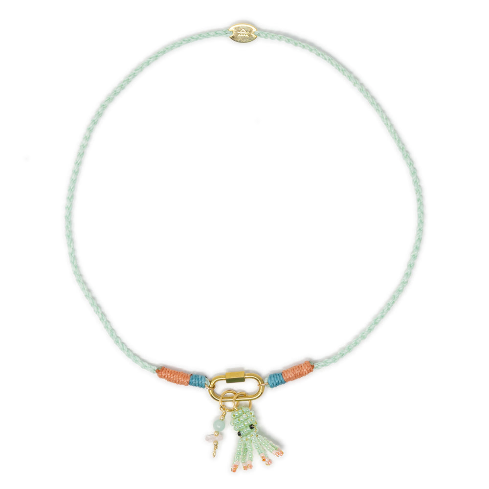 Hand braided mint cord charm necklace show with octopus & stone charms on white