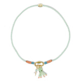 Hand braided mint cord charm necklace show with octopus & stone charms on white