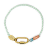 Bracelet with gold carabiner clasp for charms handmade with colorful cord on a white background
