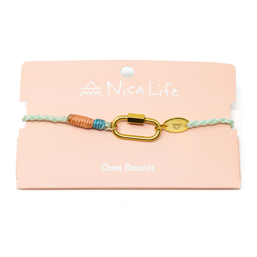 Charm bracelet with gold carabiner clasp made with colorful cord on a Nica Life branded card