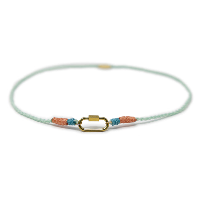 Hand braided cord charm necklace with gold carabiner for charms shown on white front front