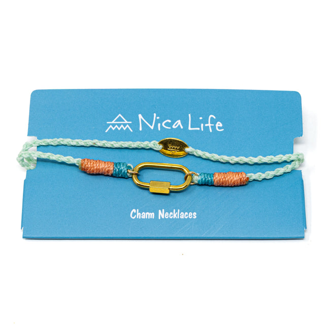 Hand braided cord charm necklace with carabiner for charms shown on a blue card with 'Nica Life' branding