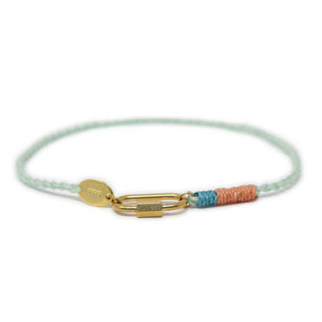 Colorful cord anklet with gold  carabiner clasp for charm and colorful cord on a white background