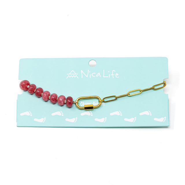 Dark pink stone & gold chain charm bar anklet with gold carabiner clasp for charms on teal Nica Life branded card