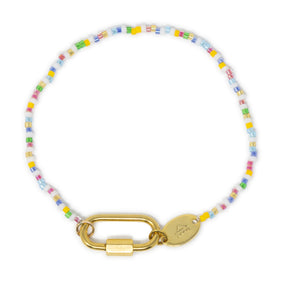 Bright multicolored beaded charm bracelet with a gold carabiner clasp for charms on a white background