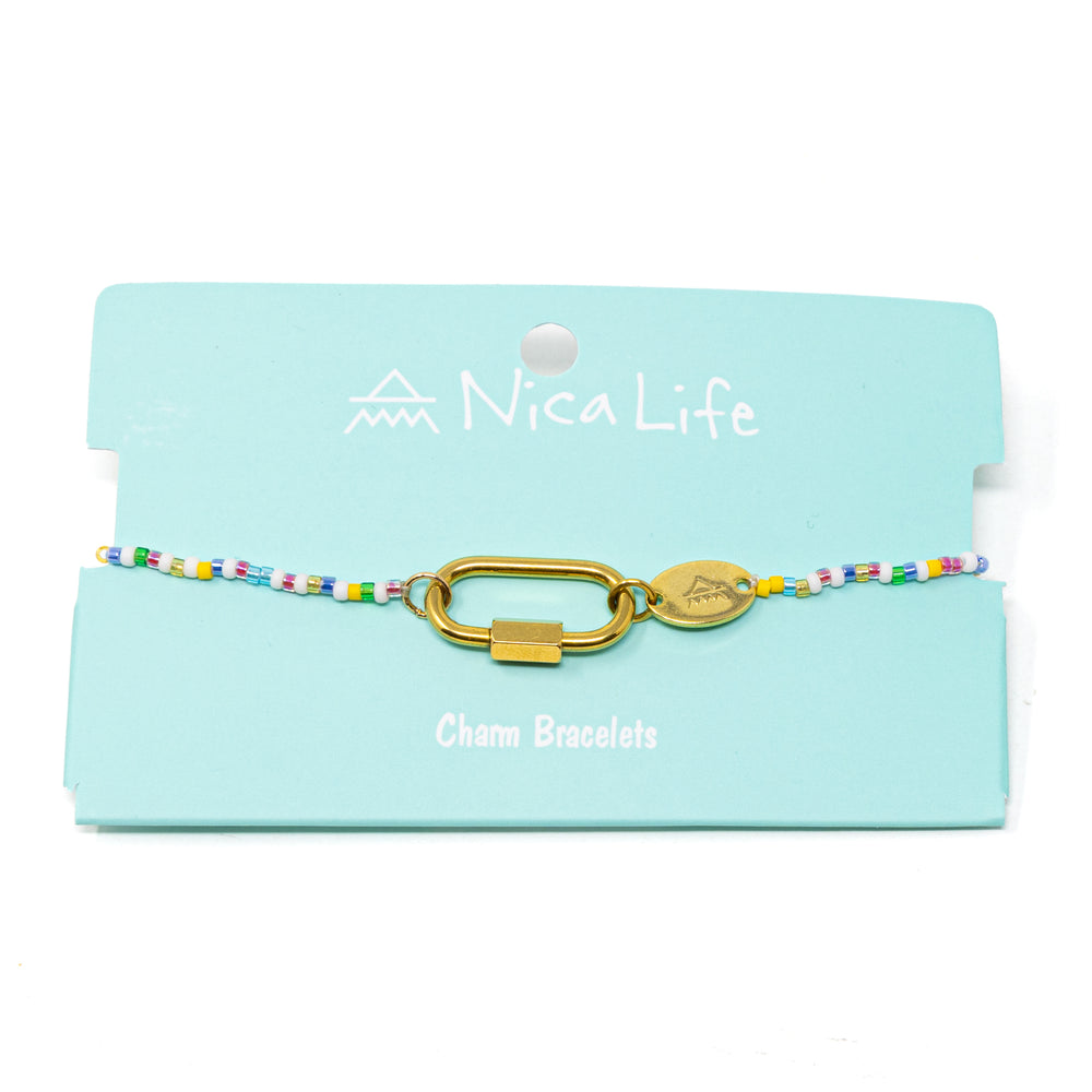 Bright mulit color charm bar bracelet with gold carabiner clasps for charms on a teal Nica Life branded card.
