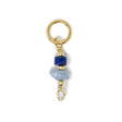 Lapis and blue opal stone charm shown on white