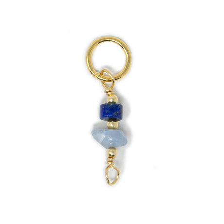 Lapis and blue opal stone charm shown on white