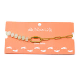Mint color stone bead & gold chain charm bar anklet with a gold carabiner clasp for charms on coral Nica Life branded card