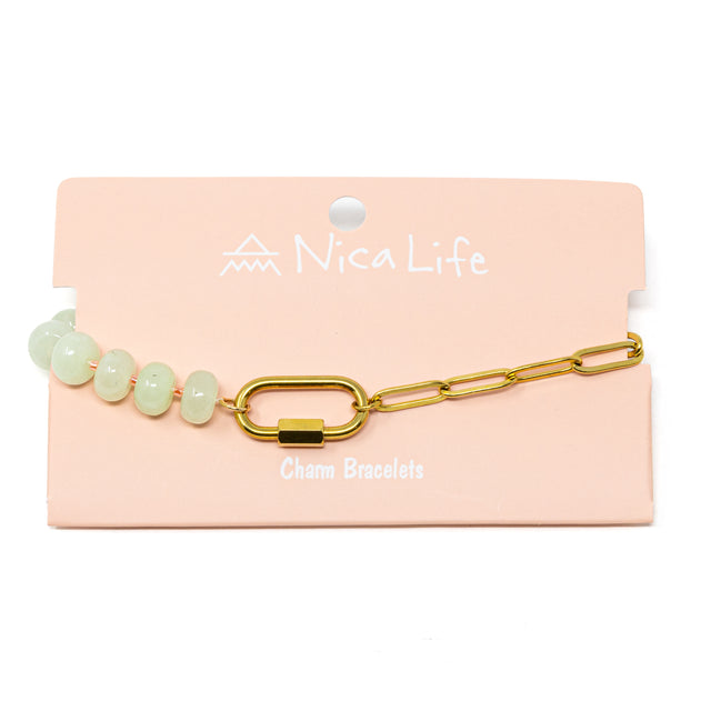 Mint stone pony beads and gold chain charm bar bracelet with a gold carabiner for charms on a pink branded Nica Life card