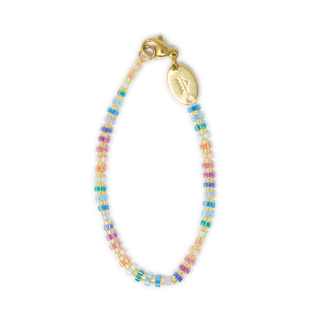 Hand beaded bag charm in bright fun pastel rainbow colors show on white