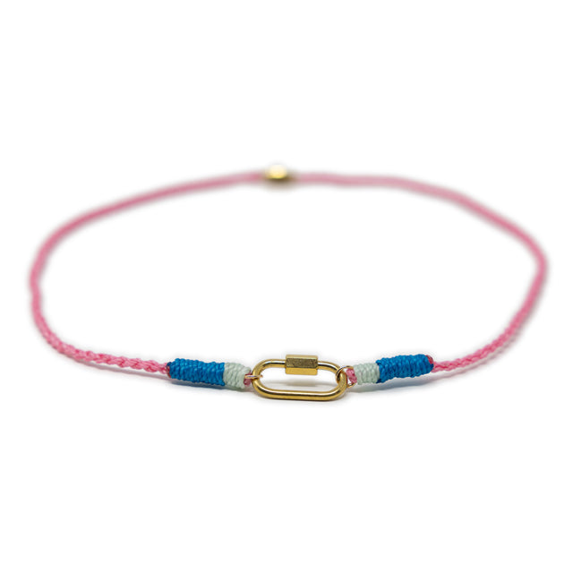 Pink cord charm necklace with gold carabiner clasp for charms on white front view