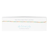 Pastel rainbow color seed bead choker on Nica Life brande card