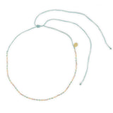 pastel colored rainbow beaded waterproof choker necklace top view shown on white